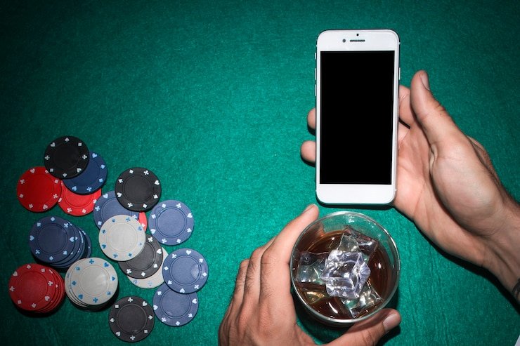 Android mobile phone displaying geraitogel link app home screen with live football and casino games